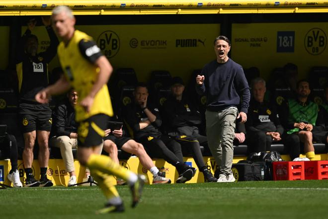 爱游戏官方-包含多特蒙德球员团结一心，破敌成功的词条